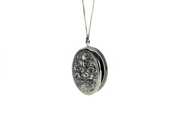 Locket Silver locket on white background locket stock pictures, royalty-free photos & images