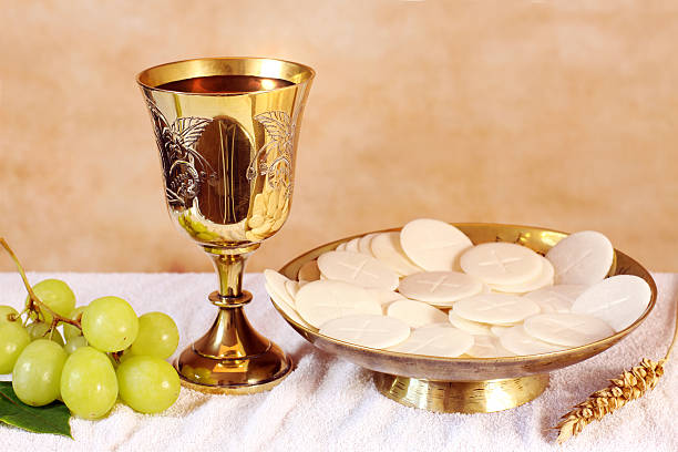 istock Chalice of wine and a platter with the Communion 182473029