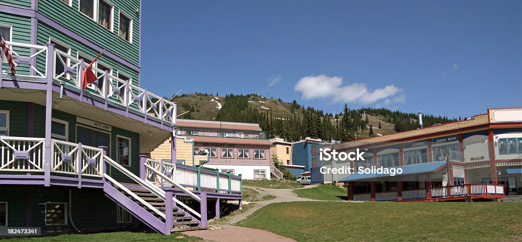 Silver Star Village Vernon British Columbia Ski Resort in summer. Small amounts of snow on Mountain. British Columbia Stock Photo