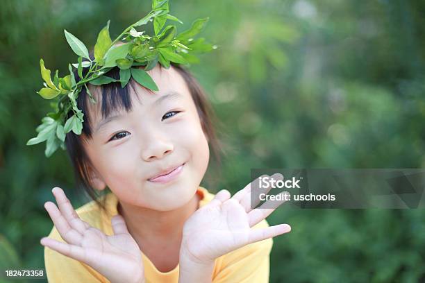 Cute Little Asian Girl Looking At Camera Stock Photo - Download Image Now - Laurel Wreath, Asian and Indian Ethnicities, Candid