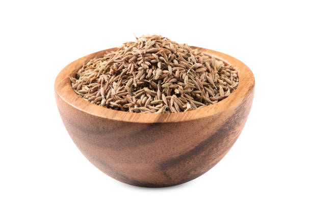 istock Bowl of aromatic caraway (Persian cumin) seeds isolated on white 1824735743