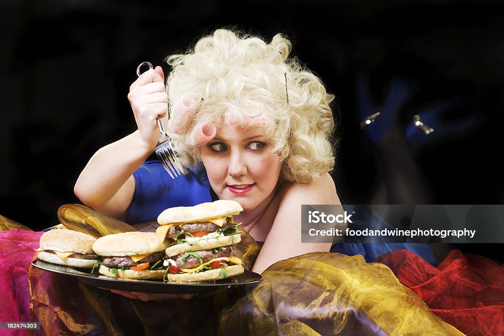 mine a hungry model about to have a few burgers Bulimia Stock Photo