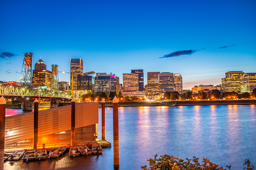 The skyline of downtown Oakland, California on a summer evening. This still image is part of a series taken at different times of day from the same location; a time lapse is also available.