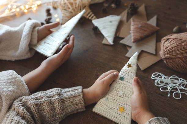 istock Children making Christmas decorations from yarn 1824753899
