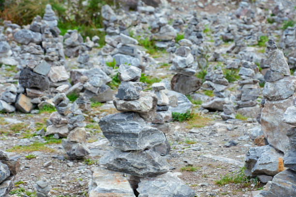 The practice of mental health. Manual installation of natural stone for balancing. Harmony and positive mind. Relaxed spiritual hand arrangement, tower enjoying life