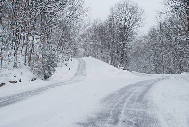 Two country roads in winter stock photo