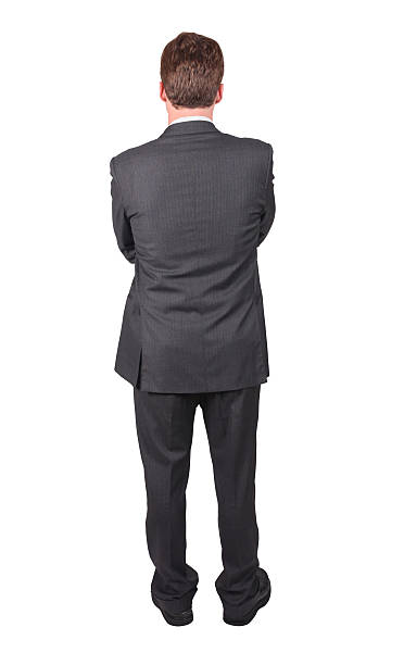 istock Isolated business man arms folded rear view 182476211