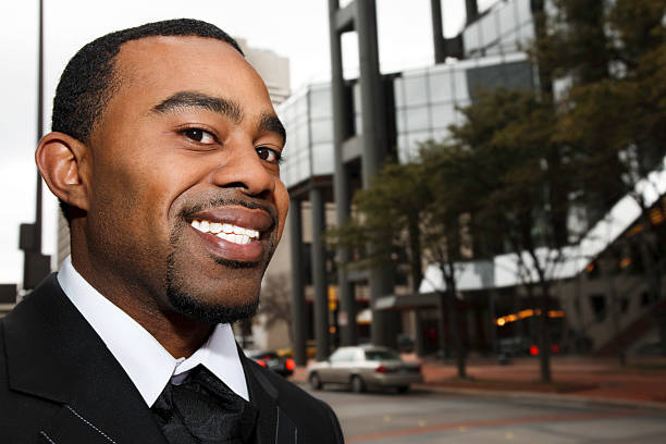 istock Smiling Businessman Portrait Outside Office Building Downtown 182476540