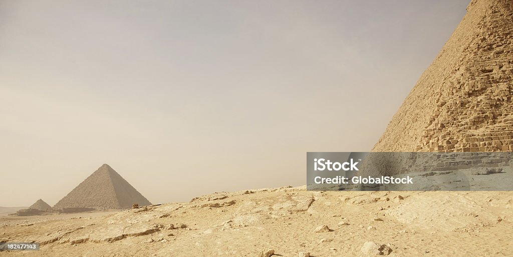 Old ruins of pyramids on a barren landscape Old ruins of pyramids on a barren landscape of Egypt Africa Stock Photo