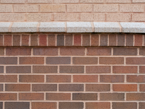 Horizontal image of a brick wall with decorative ledge.See other related images here: