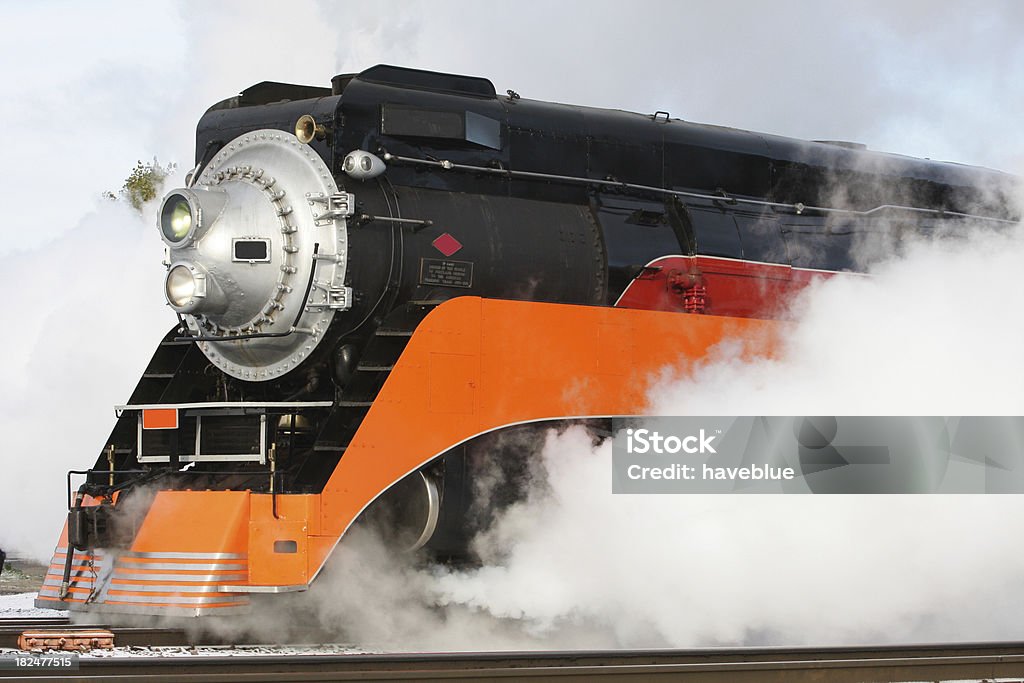 Streamline Steam Engine Streamline Steam Engine pulls a load of passenger cars Black Color Stock Photo