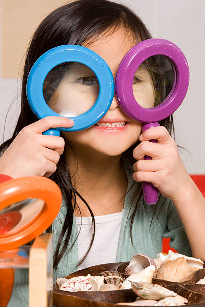 istock Goofy Girl with Magnifying Glasses 182477879
