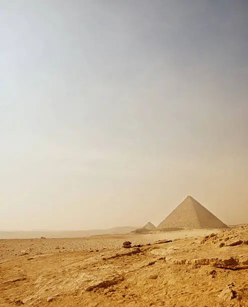 Photo of Pyramid of Giza on an arid landscape
