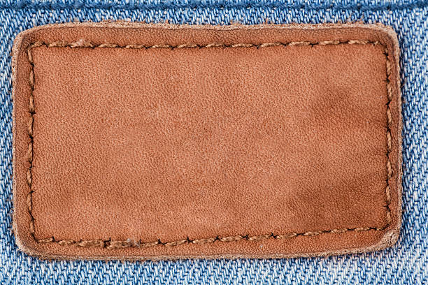 jeans applicazione in pelle - leather patch denim jeans foto e immagini stock