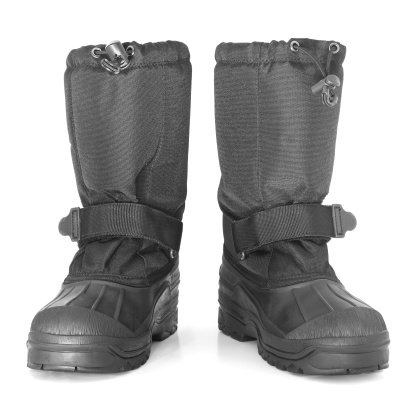 A pair of black snow boots isolated on a white background.