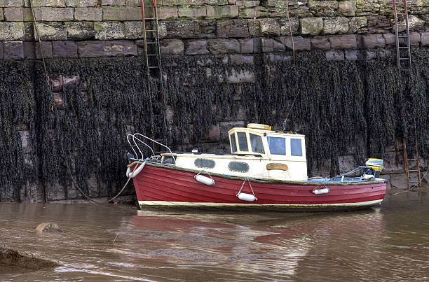 istock Boat in Tayport Harbour, Scotland. 182478811