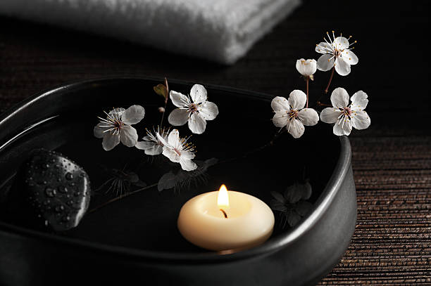 istock Zen Spa with Floating Candle and Blossoms 182478828