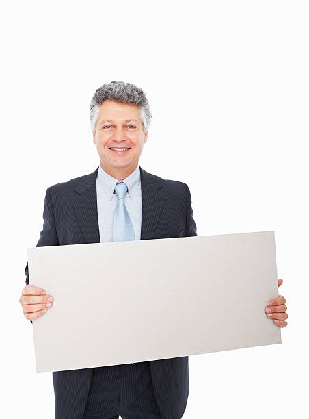istock Business man with an empty billboard on white 182478940