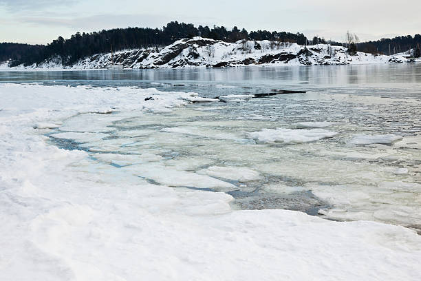 istock Winter with ice flows in the water. 182479051