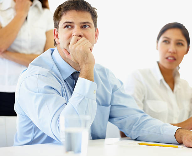 istock Business man sitting attentively at a meeting 182479078