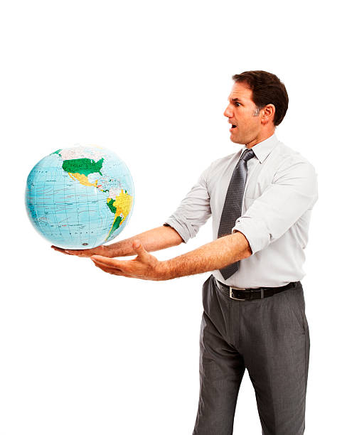 istock Surprised businessman holding a globe 182479250