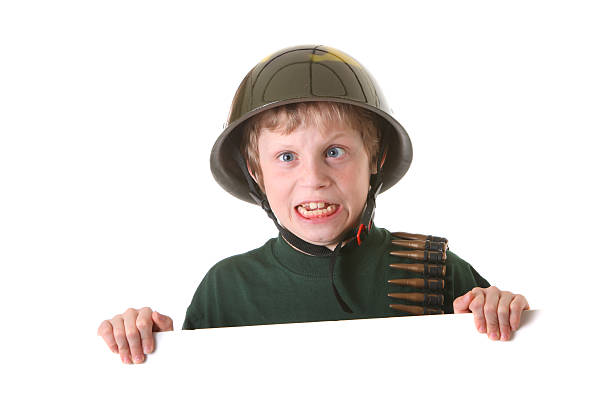istock funny army boy with sign 182479632