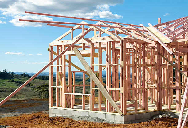 Timber frame construction of a house in rural New Zealand.