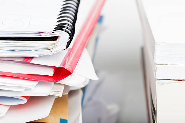 istock stacks of papers and brochures 182480033