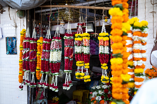 Colorful Marigold flower garlands, other offerings to offer to God during worship at little India, Singapore