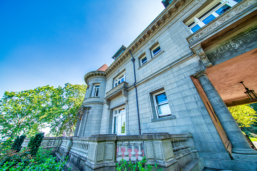 Estonian government building Stenbock House on Toompea hill in old Tallinn city, Estonia. Seagull in blue sky