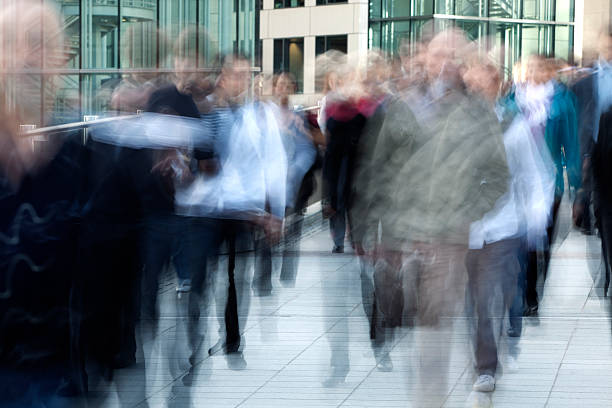 istock Crowd of Business Commuters, Blurred Motion 182480280