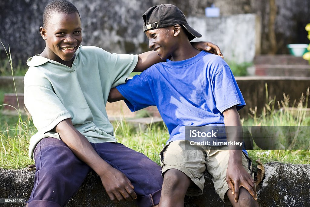 Ragazzi della Liberia - Foto stock royalty-free di Abbigliamento casual