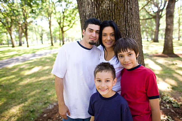 istock hispanic family at a park 182481333