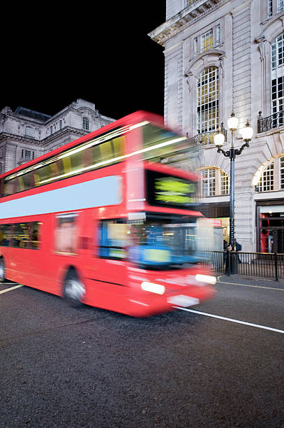 istock Red double-decker bus at Piccadilly Circus in London, England 182482567