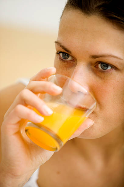 istock woman with juice 182482969