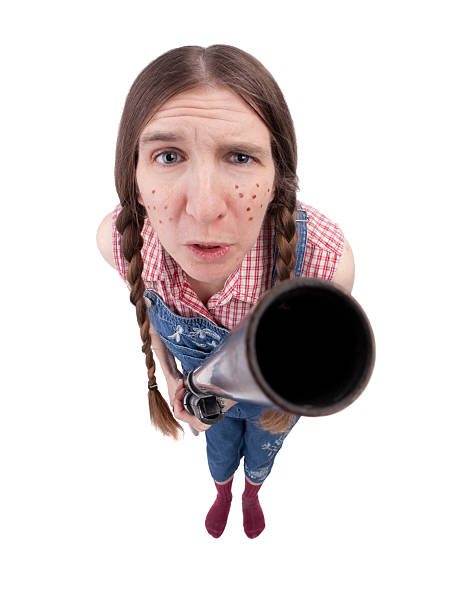istock Suspicious Redneck Woman With Gun 182483075
