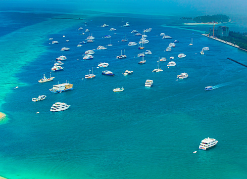 Photo of aerial view of tropical island in Maldives