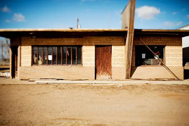 Abandoned building along Route 66 in Tucumcari, New Mexico.  Photographed with a tilt shift lens.
