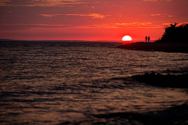 istock Couple at beautiful sunset 182483553