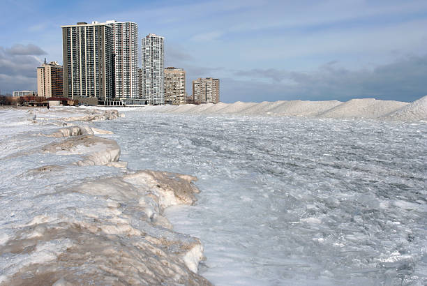 istock Skyscrapers over frozen lake 182483559