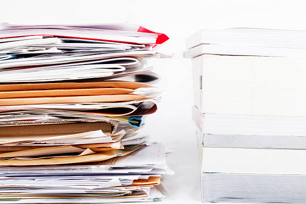 istock stacks of files, papers and brochures 182483748
