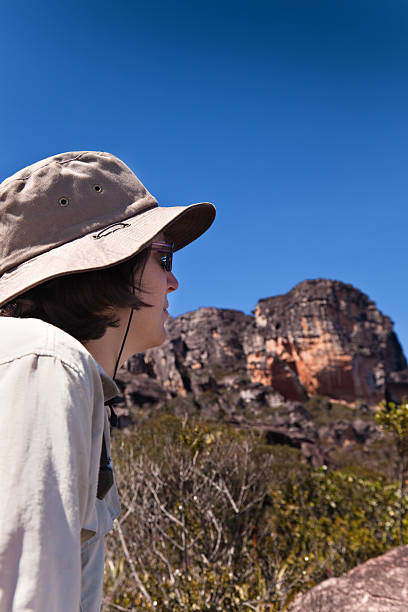 istock Pensive woman with sunglasses and hat 182483917