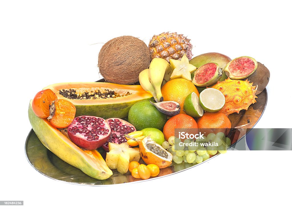 fresh fruits sliced on tablet exotic fresh fruits Banana Stock Photo