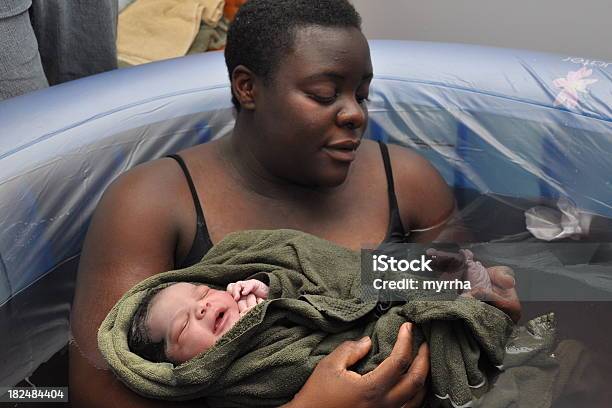 Baby Day Water Birth Checking Toes Stock Photo - Download Image Now - Water Birth, Women, Home Birth