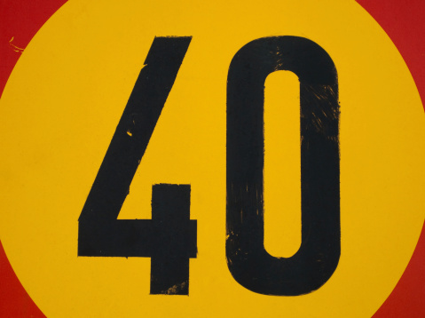 Grunge Number 40 close up from a speed limit sign.
