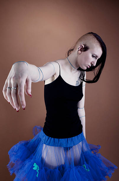 istock funky gothic young woman with undercut indoor, portrait 182484678