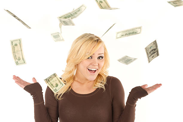 istock Isolated Girl with Falling Money 182485209