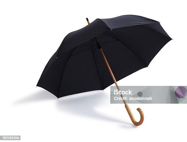 Foto de Black Guardachuva Isolada Em Um Fundo Branco e mais fotos de stock de Guarda-chuva - Guarda-chuva, Cor Preta, Figura para recortar