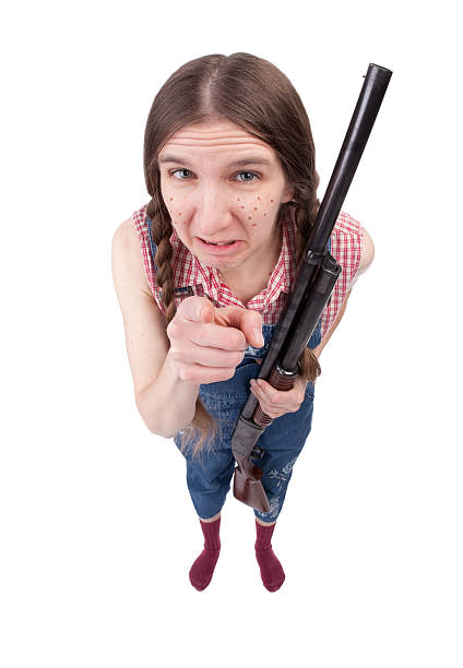 istock Angry Redneck Woman With Gun 182485618
