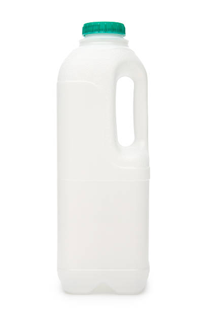 Empty milk bottle stock photo